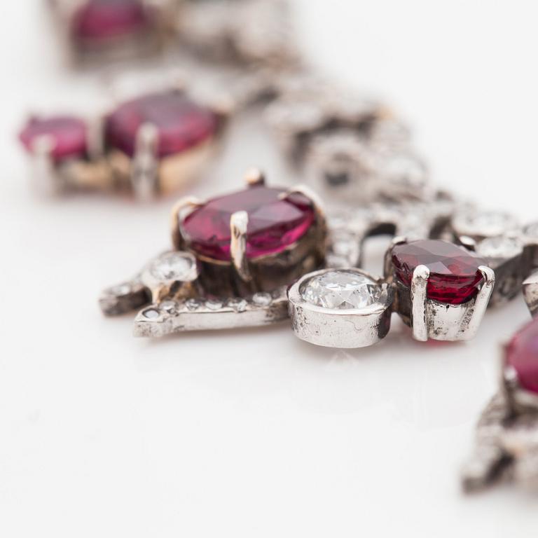 A 23.88ct ruby and brilliant cut diamond necklace. Total carat weight of diamonds 8.00cts. Mandelstam 'Stardust galaxy'.