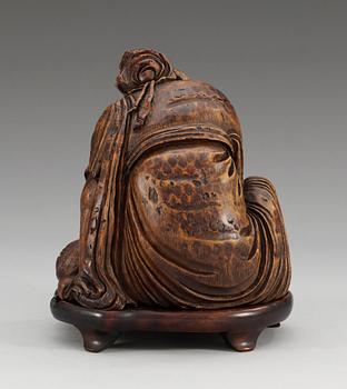 A carved bamboo figure of Do Fan So, Qing dynasty (1644-1912).