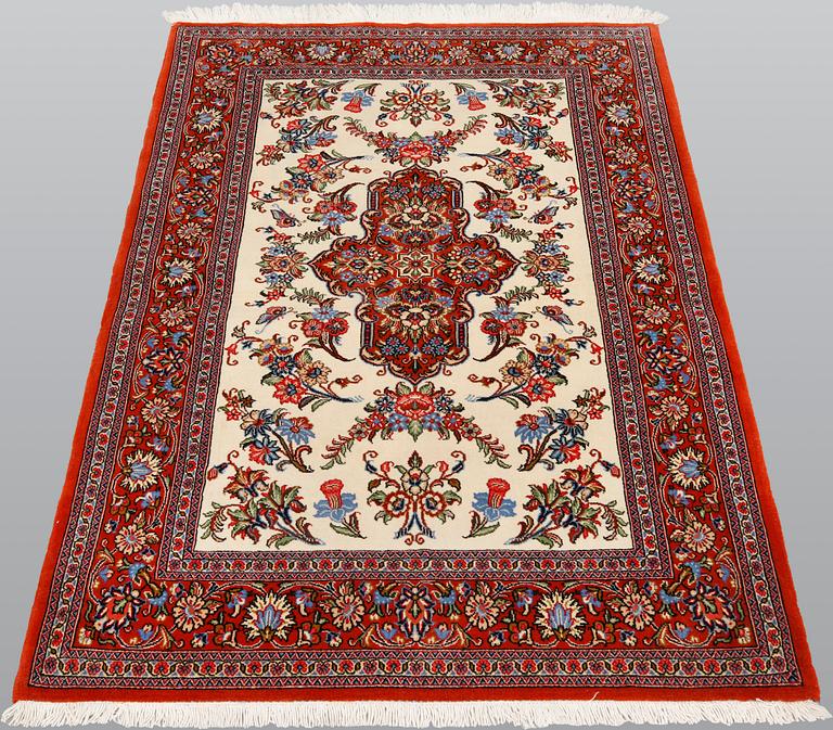 A Ghom rug, ca 155 x 105 cm.