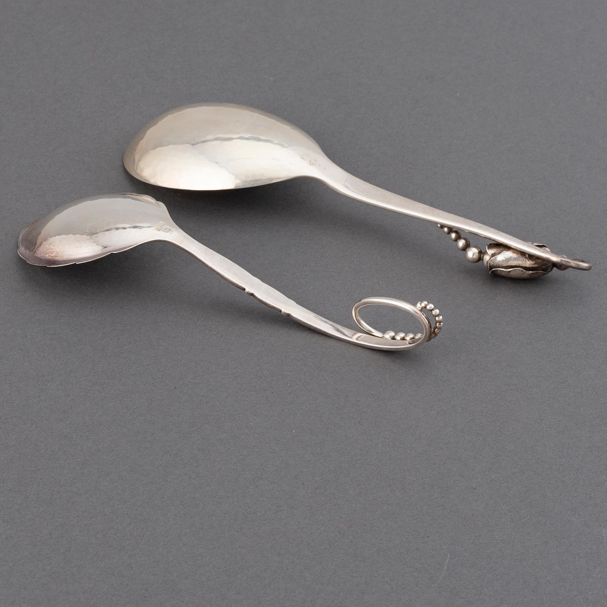 GEORG JENSEN, two sterling silver serving spoons 