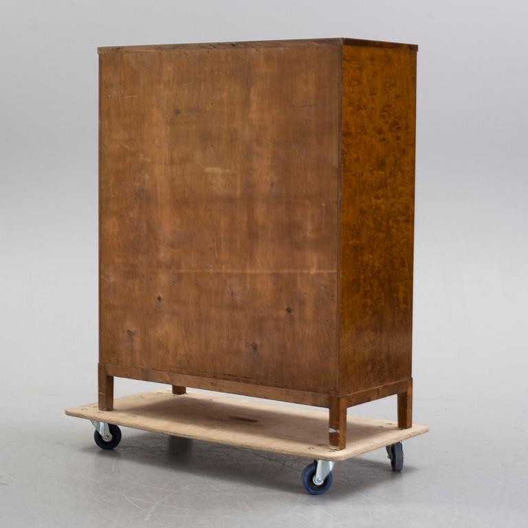 A Swedish Modern birch veneered cabinet, 1930's.