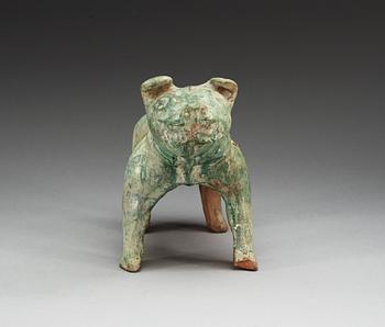 A green glazed figure of a Tibethan dog, Han dynasty (206 BC-220 AD).