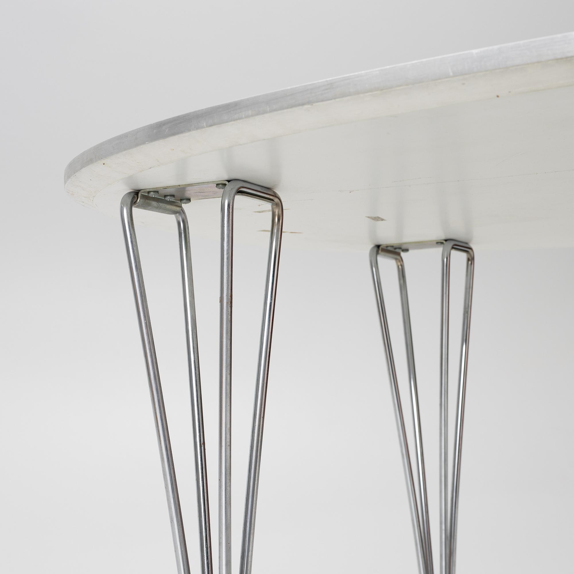 Bruno Mathsson & Piet Hein, dining table, “Superellips”, Fritz Hansen, Denmark, 1988.