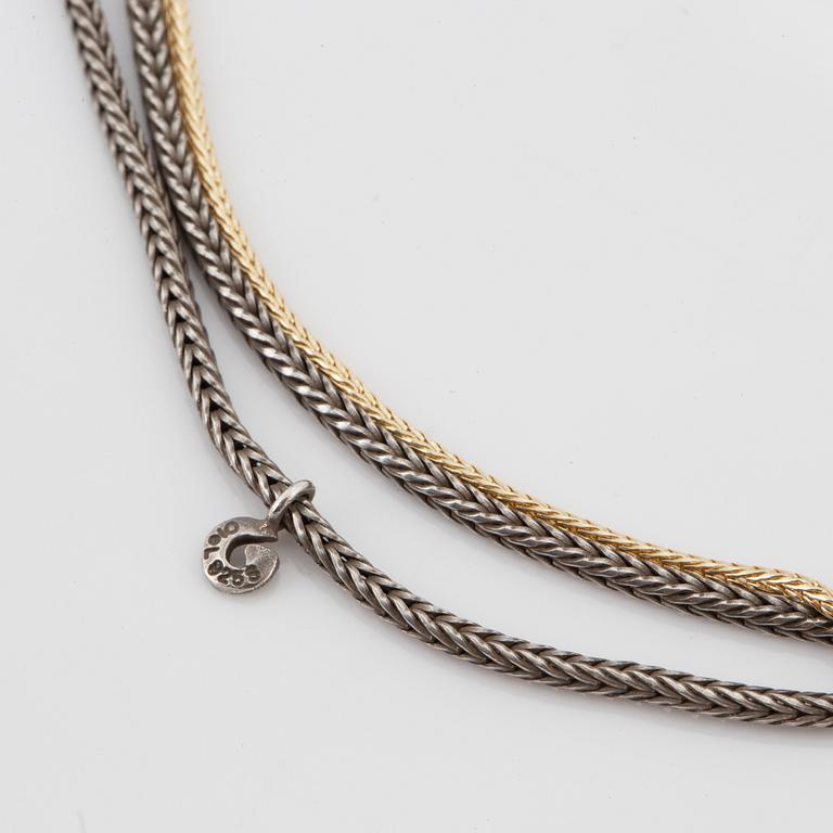 OLE LYNGGAARD, clasp 14K gold and chain.