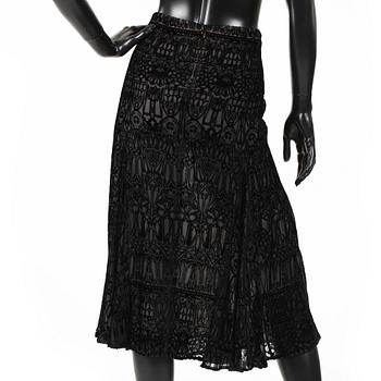 ALEXANDER MCQUEEN, a black skirt.