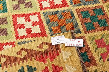 A Kilim carpet, c. 298 x 204 cm.