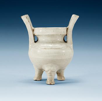 A pale grey-bluish glazed tripod censer with decor in relief, and archaistic mark, Ming dynasty (1368-1644).