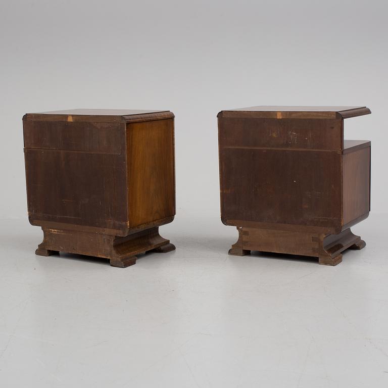 A pair of first half of the 20th century bedside tables.