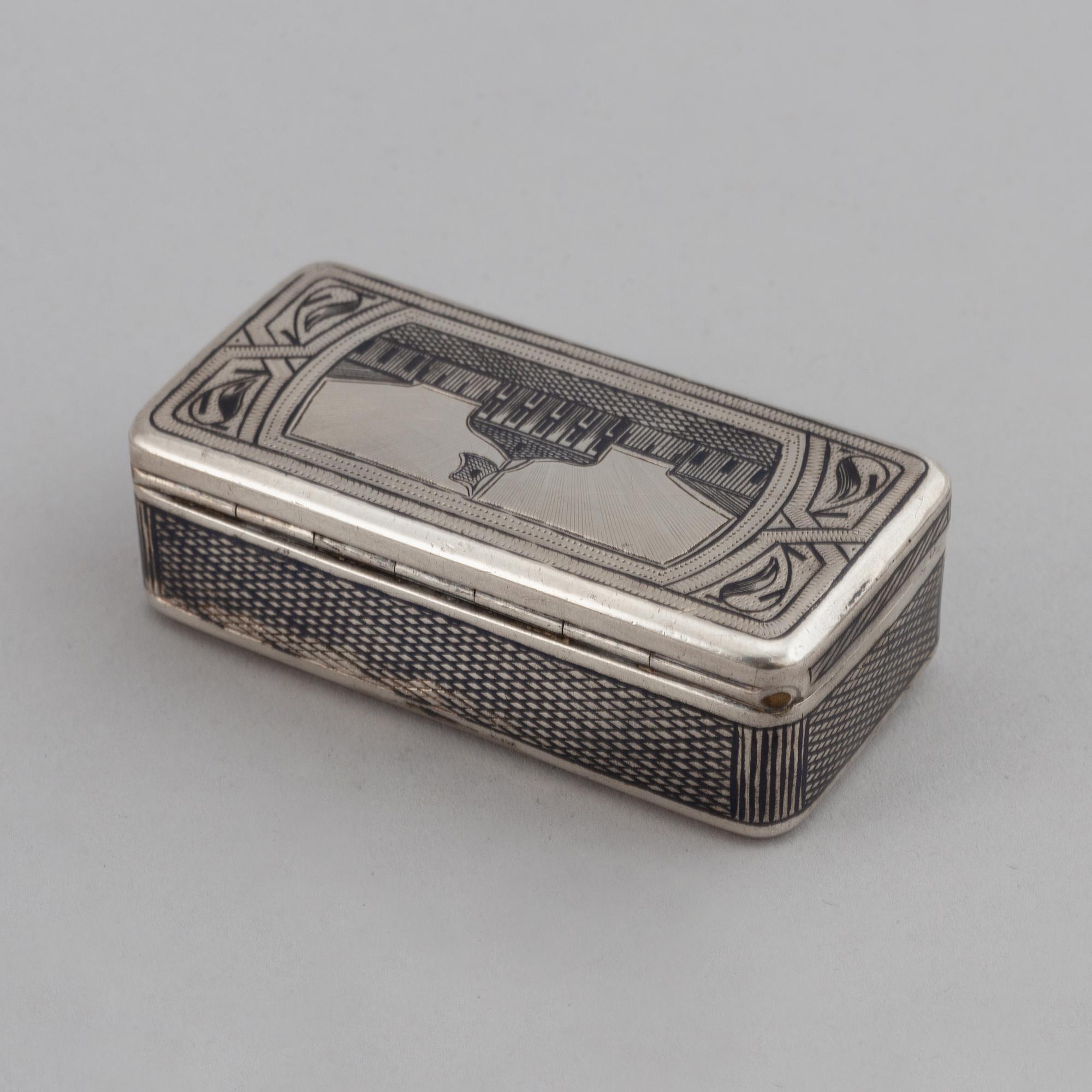 A Russian parcel-gilt silver niello box, unidentified makers mark, Moscow 1888.