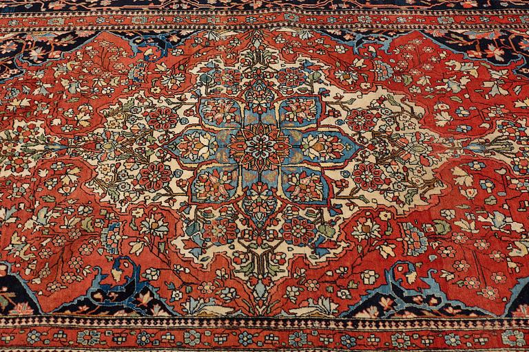 A RUG, an antique/semi-antique Kashan Motachem, ca 213 x 141,5 cm.