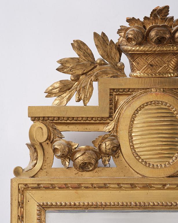 A Gustavian giltwood mirror, Stockholm, late 18th century.