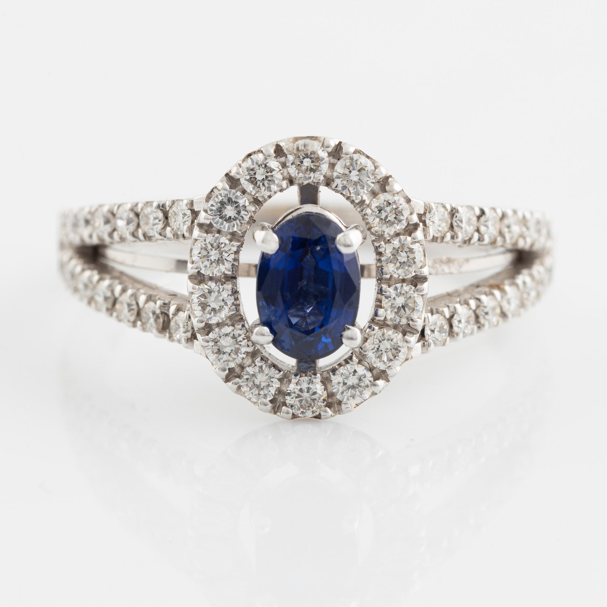 Oval sapphire and brilliant cut diamond ring.