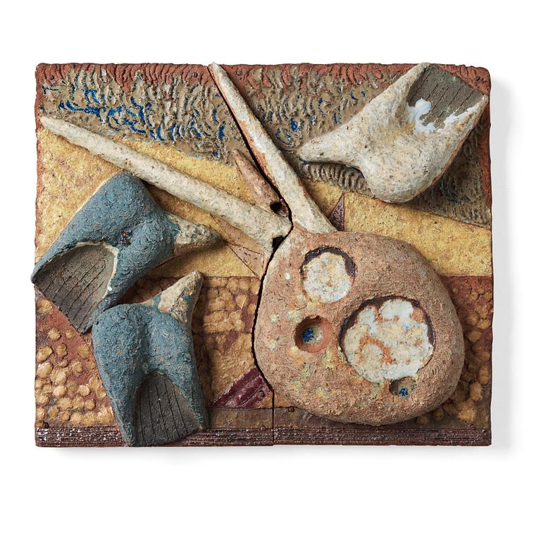 Tyra Lundgren, a stoneware relief 'Reclining pecock dove', Sweden 1950-60's.