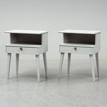 A pair of mid 20th century bedside tables.