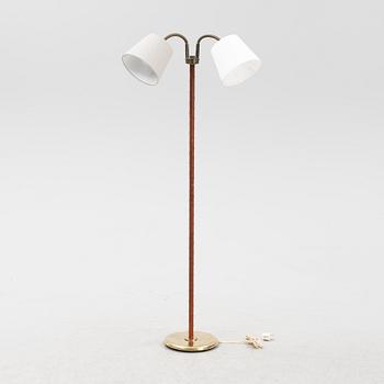 A mid 20th Century double headed floor lamp.