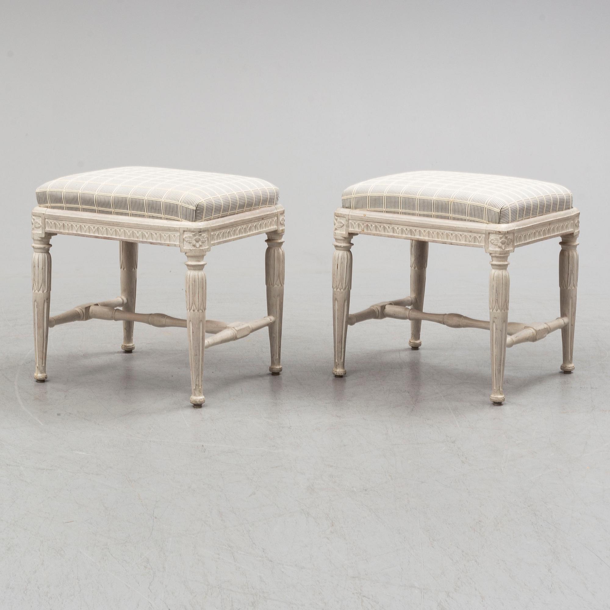 A pair of gustavian late 18th century stools by Erik Öhrmark (master in Stockholm 1777-1813).