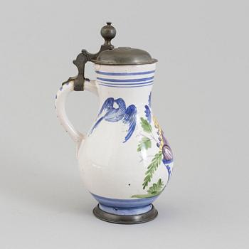 AN 18TH CENTURY FAYENCE AND PEWTER JUG.