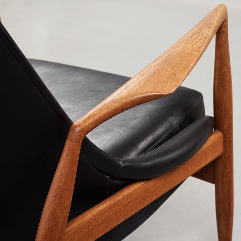 Ib Kofod-Larsen, a 'Seal' teak and black leather armchair, Olof Persson Möbler, Jönköping, Sweden 1950's-60's.