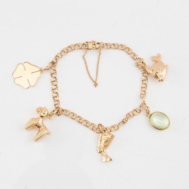 Bracelet Bismarck link 18K gold with charms.