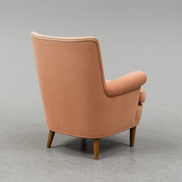 A 'Hemmakväll' easy chair by Carl Malmsten.