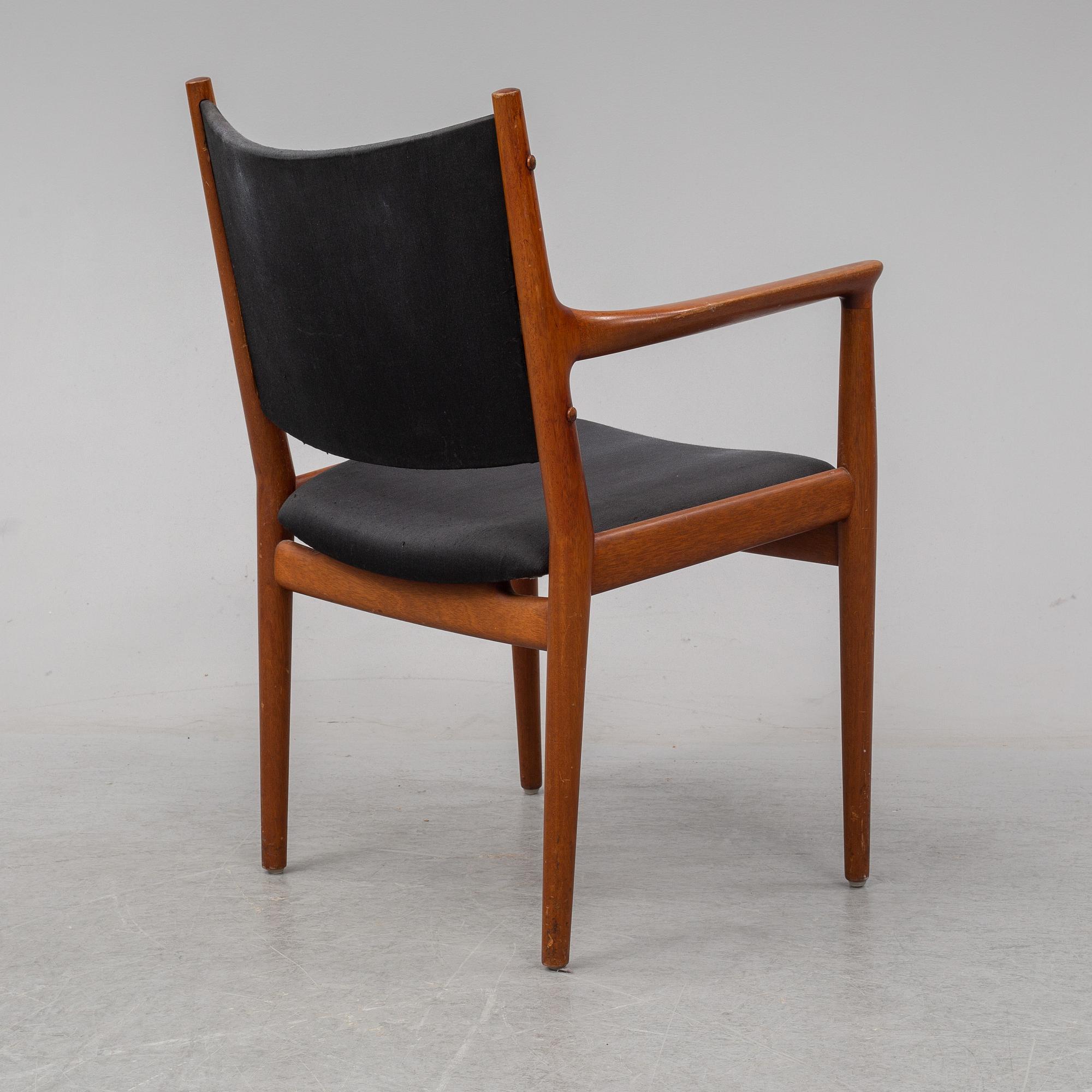 A teak armchair by Hans J Wegener for Johannes Hansen.