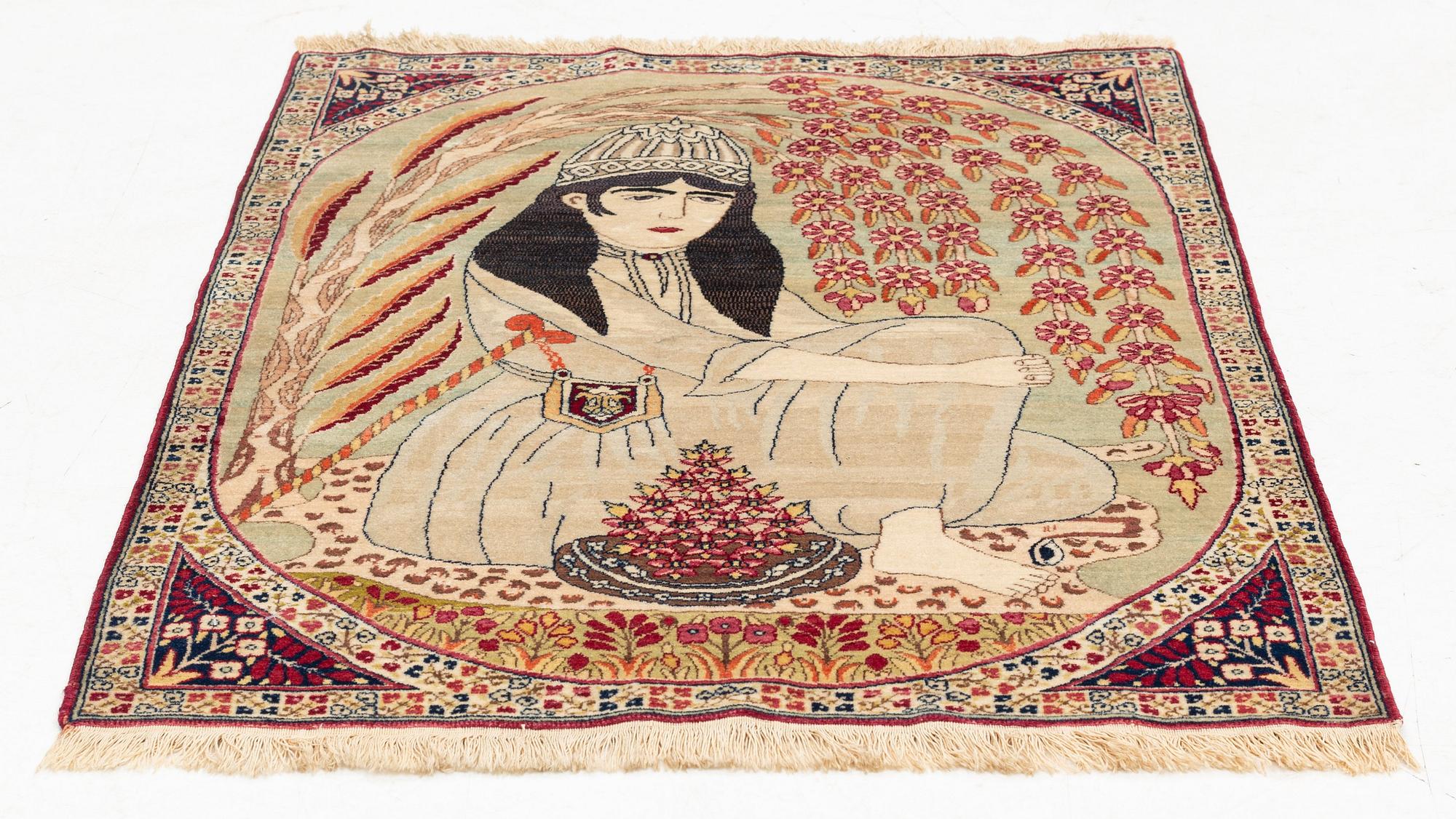 An antique pictorial Kirman Lavar, ca 98 x 67 cm.