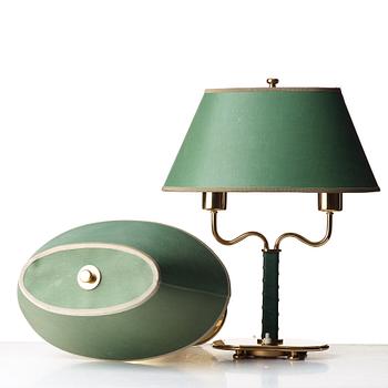 Josef Frank, a pair of brass and green leather table lamps, Svenskt Tenn, model 2388.