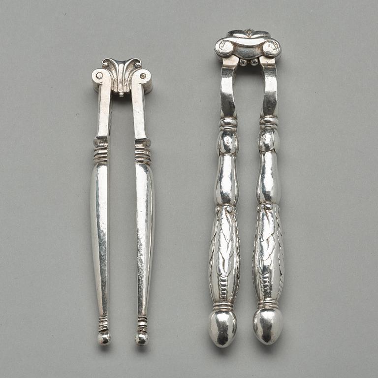 Georg Jensen, OCH JOHAN ROHDE, nötknäppare, 2 st, Firma Georg Jensen, Köpenhamn 1919-27, 830/1000.
