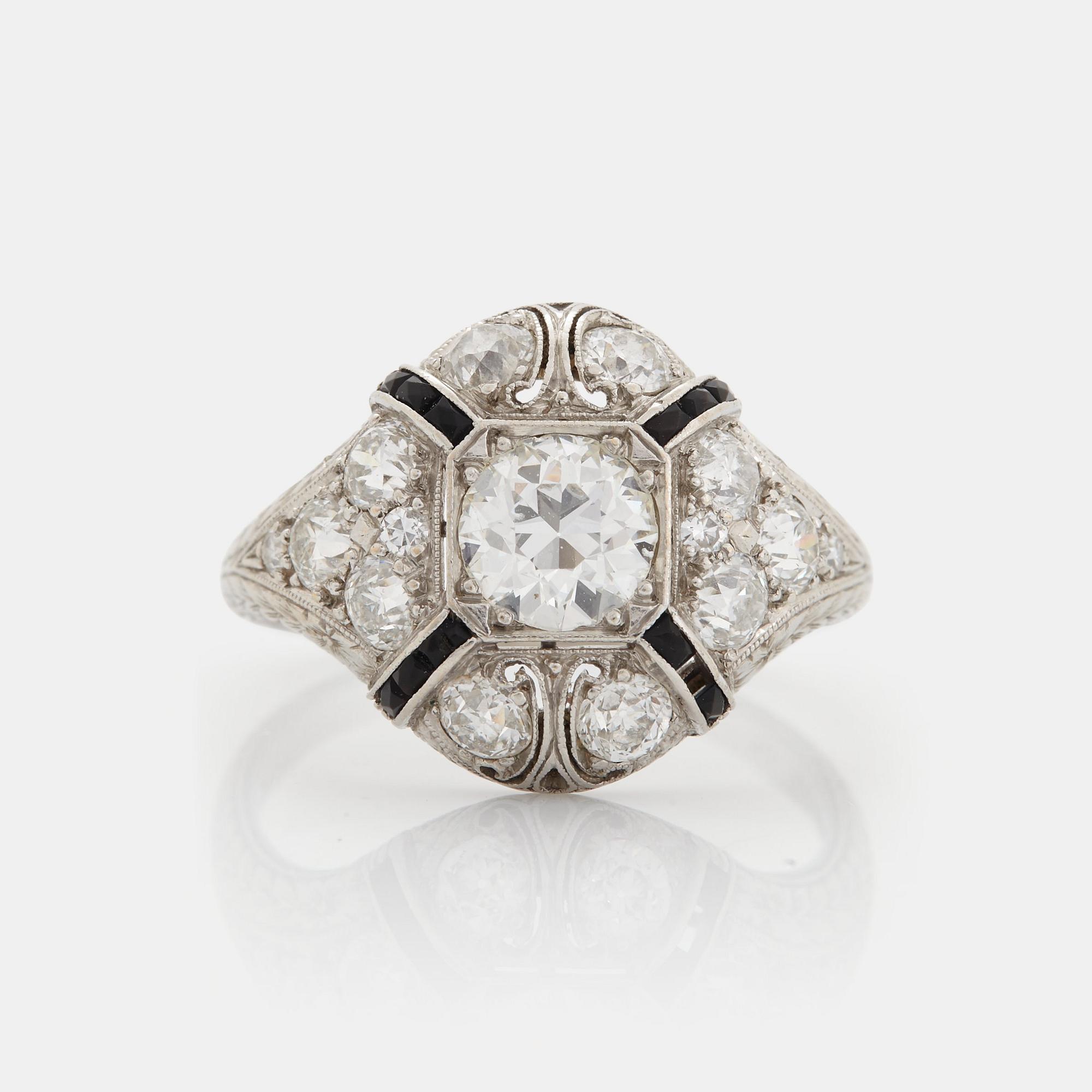 Ring platina med en gammalslipad diamant vikt ca 0.80 ct kvalitet ca H/I i.