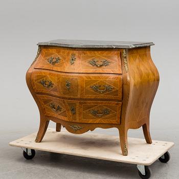 A Swedish rococo-style chest of drawers. Mid 20th century.