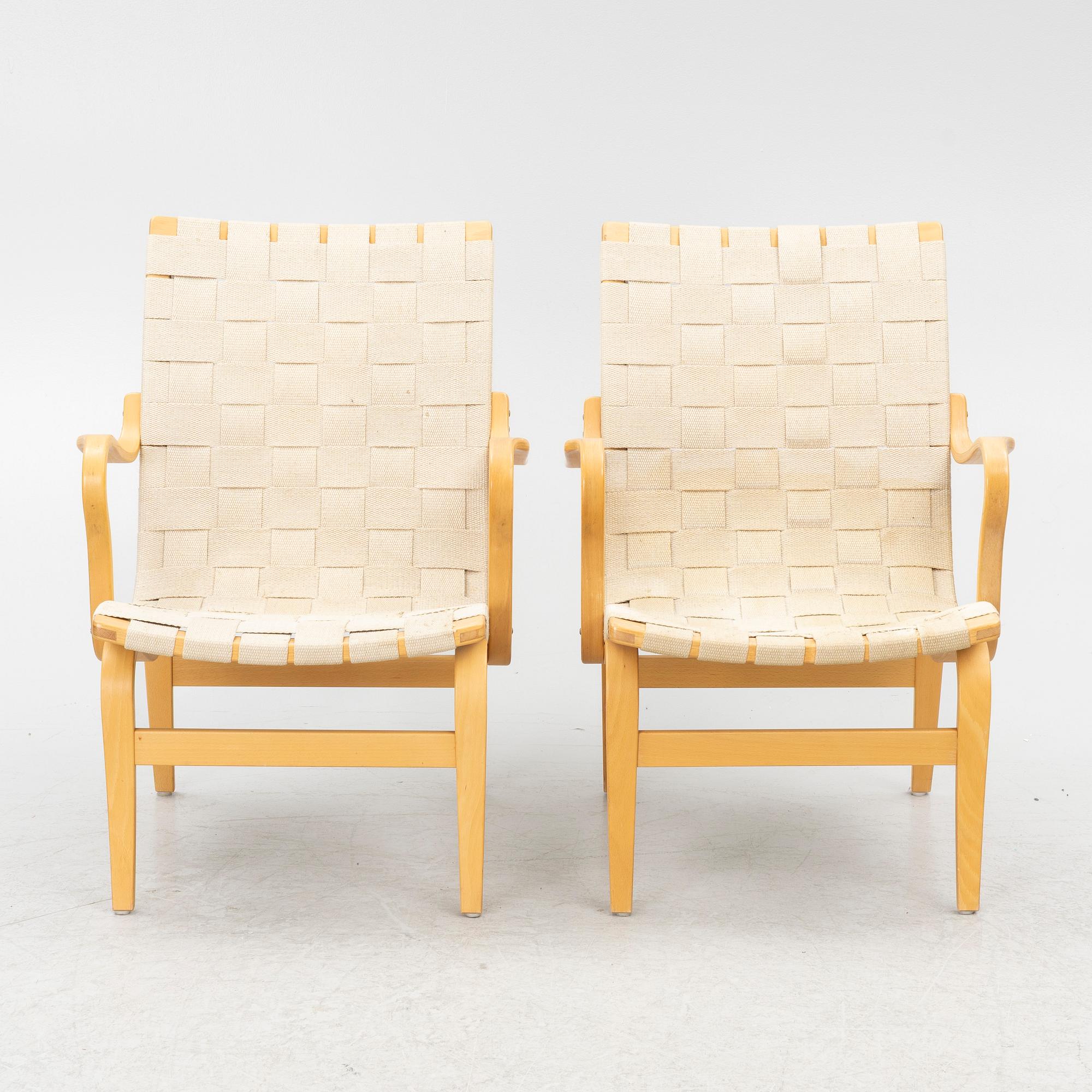 Bruno Mathsson, a pair of 'Eva' armchairs, DUX, Sweden, second half of the 20th century.