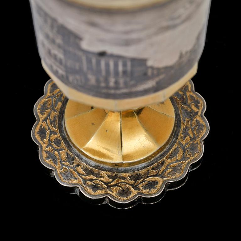 A Russian silver-gilt and niello vodka-cup, makers mark probably of Ivan Sujew, Wologda 1840's.