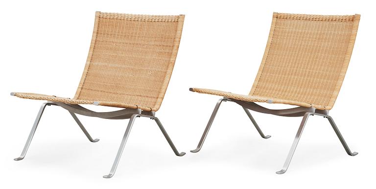 A pair of Poul Kjaerholm 'PK-22' steel and rattan easy chairs, Fritz Hansen, Denmark.
