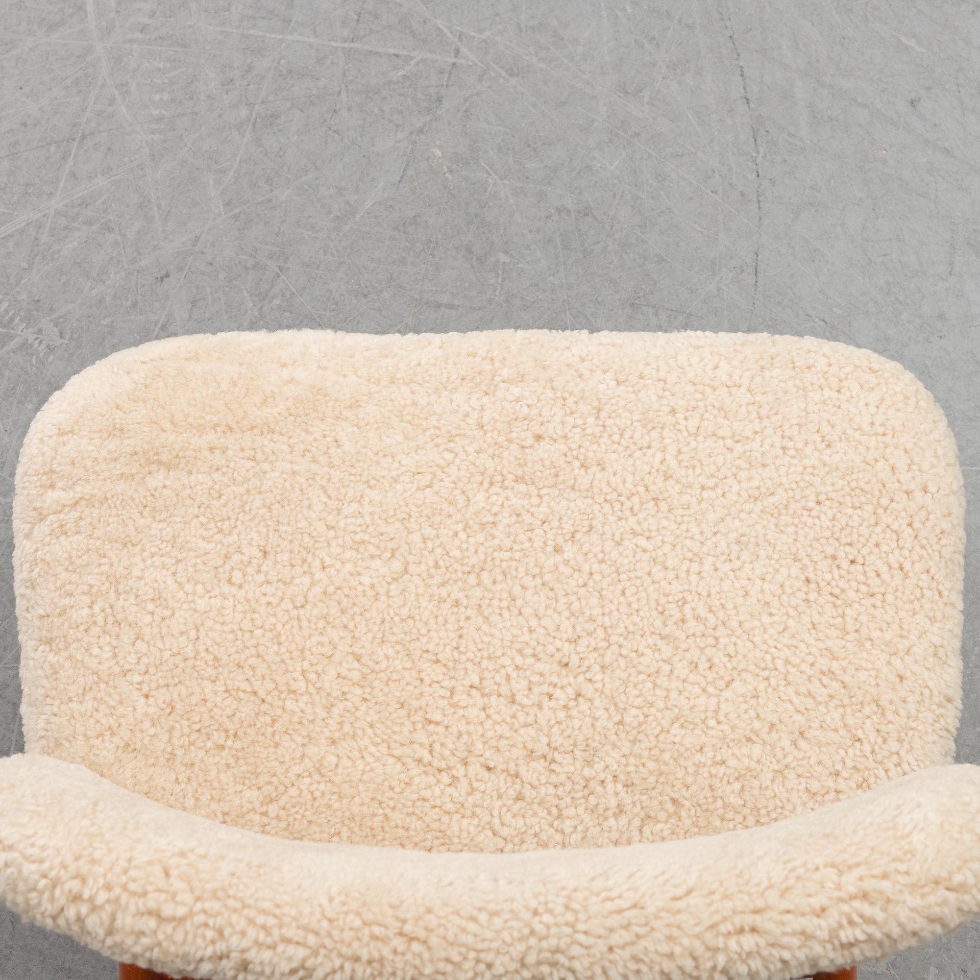 A 1950's pair of 'TeVe' easy chairs by Alf Svensson.
