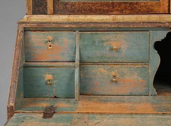 A polychrome-painted folk art cabinet from Värmland, Sweden, dated 1818.