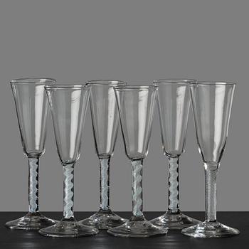 53. A matched set of six champagne flutes, England, 18th Century.