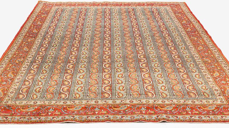 A carpet, semi-antique, Qum, ca 318 x 233 cm.