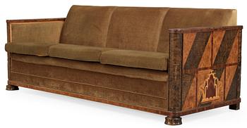 A Swedish 1930's stained birch sofa attributed to Alvar Andersson.