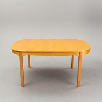 A Carl Malmsten 9-peice "Ambassaör" birch dining suite. Åfors Möbelfabrik.