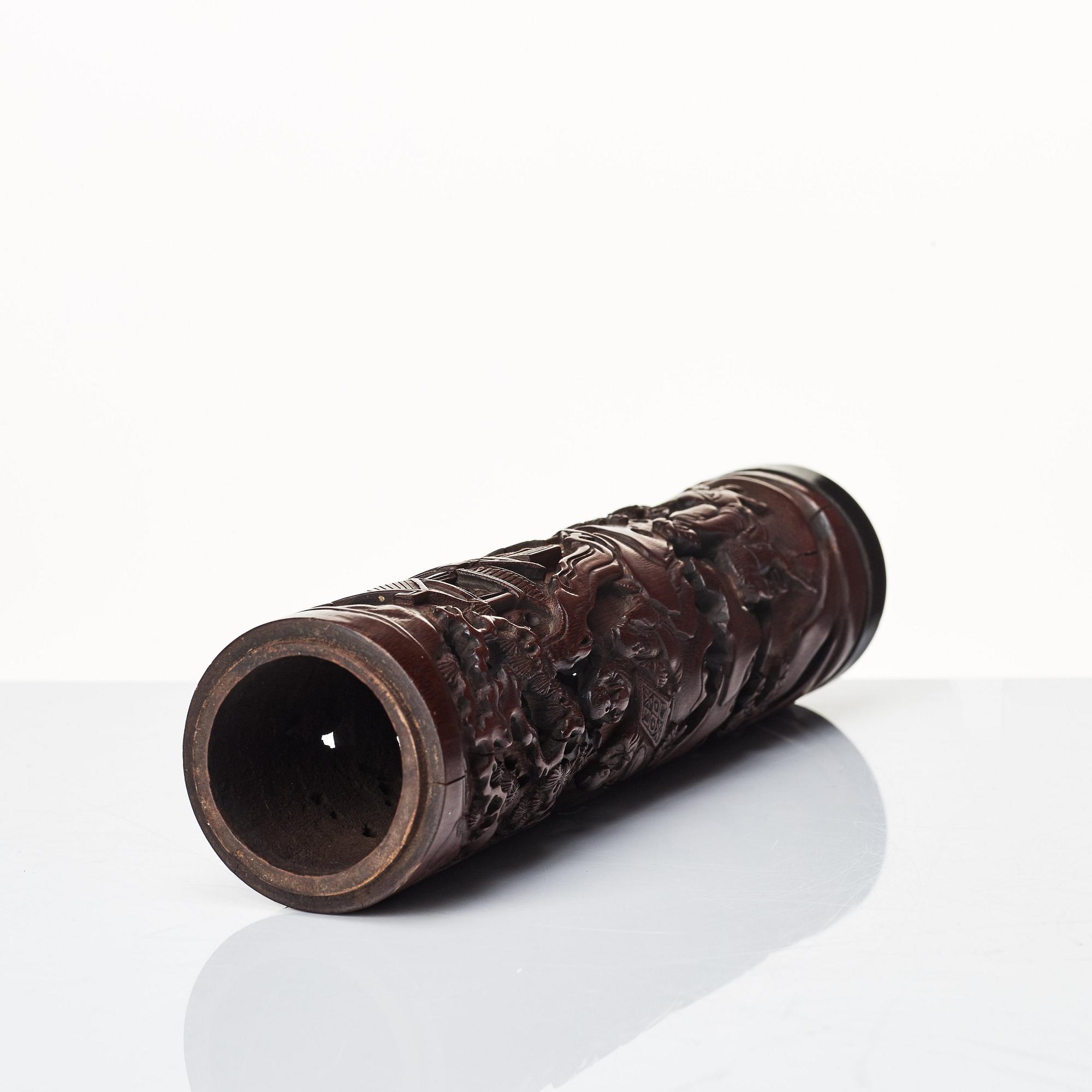 A carved cylindrical bambo parfumier, Qing dynasty, 19th Century.