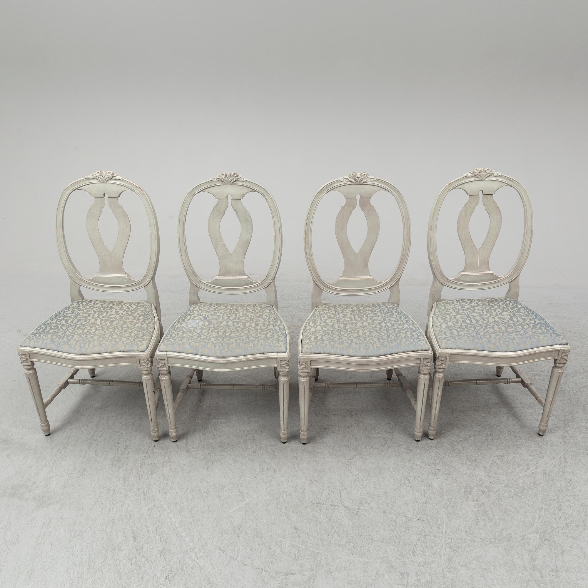 A dining table and four chairs, gustavian style, late 20th century.