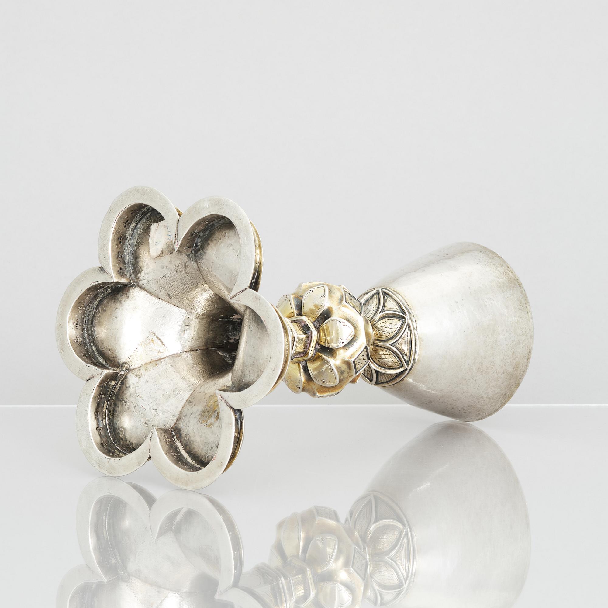 An 18th century parcel-gilt silver cup, unclear marks.