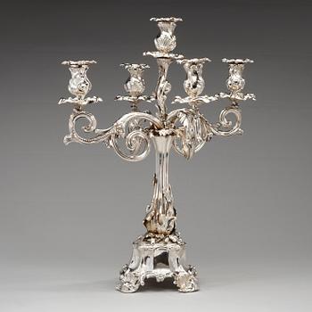 A pair of Swedish mid 19th century silver candelabra, marks of Gustaf Möllenborg-Féron, Stockholm 1856.