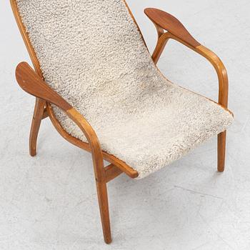 Yngve Ekström, a 'Lamino' armchair, Swedese.