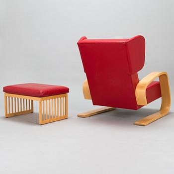 Alvar Aalto, nojatuoli ' High back tank'  E400 för Artek 1999. Ben af Sculten, rahi 445 Artek 1999.