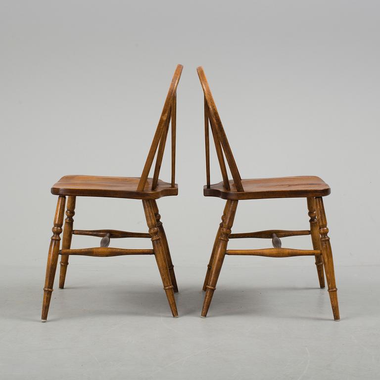 Six oak chairs from Reprodux, second half of the 20th century.