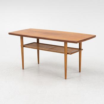 A 1960s teak coffee table.