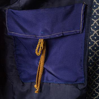 two theater coats from the late 20th century.