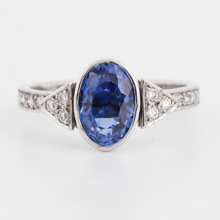 Sapphire and brilliant-cut diamond ring.