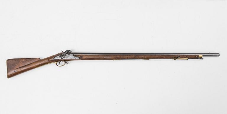 A 18th Century Swedish-British converted percussion gun.